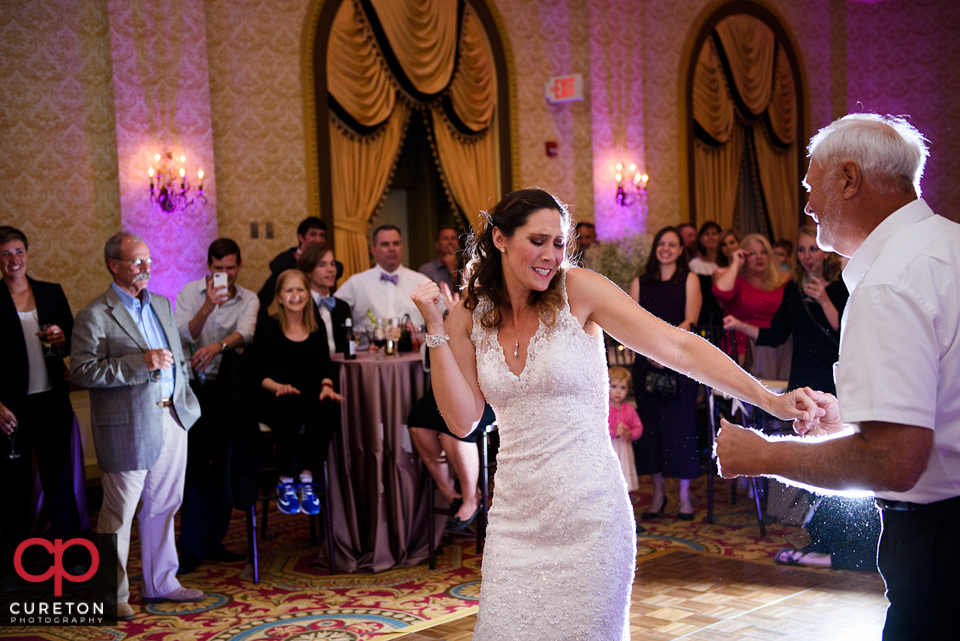 Bride and her father dancing.