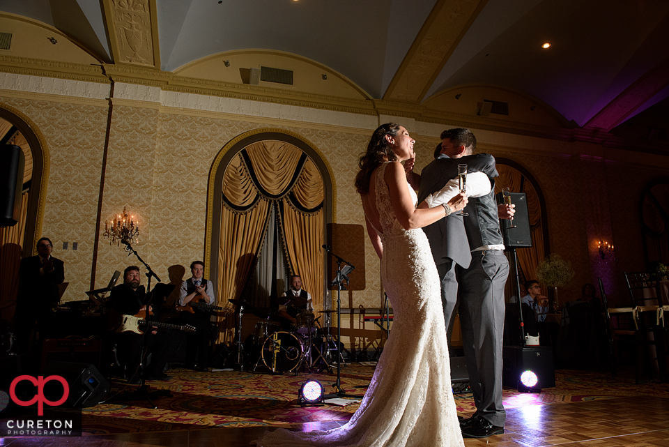 Groom hugging his best man.