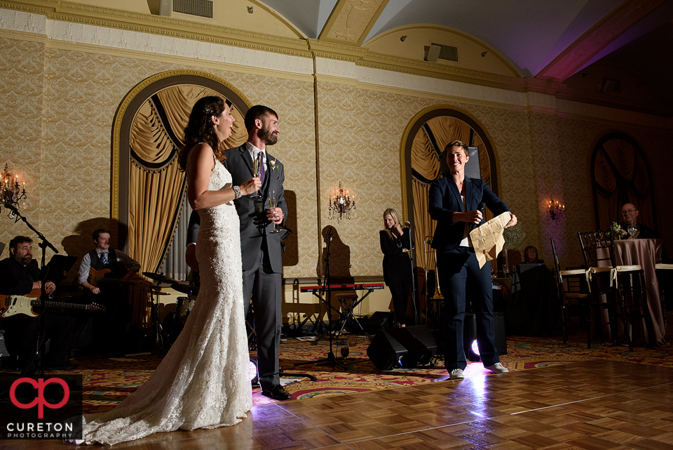 Maid of honor raises a toast at the reception.