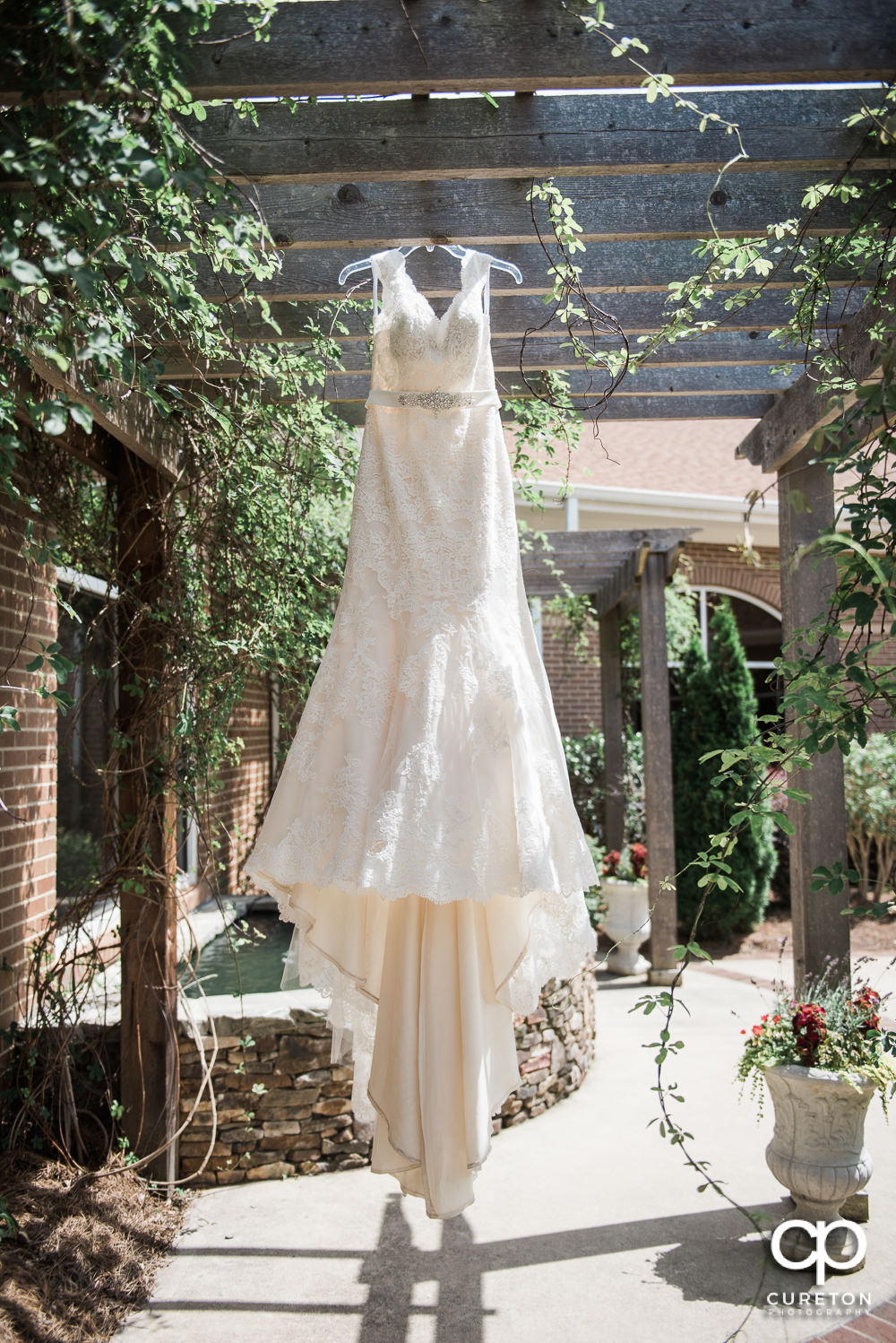 Bride's dress hanging at the church.