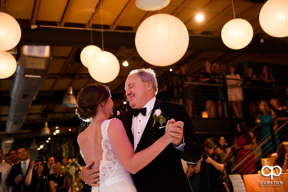 Bride and father dance at the wedding reception at Zen in downtown Greenville SC.