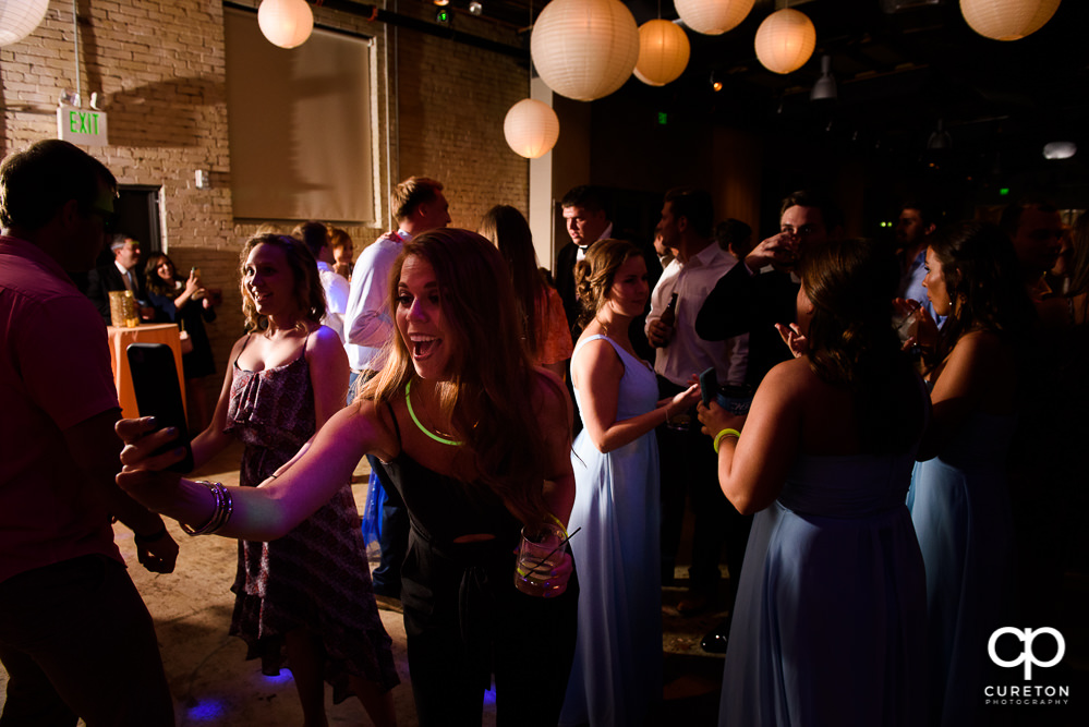 The wedding guests dancing at the reception at Zen.